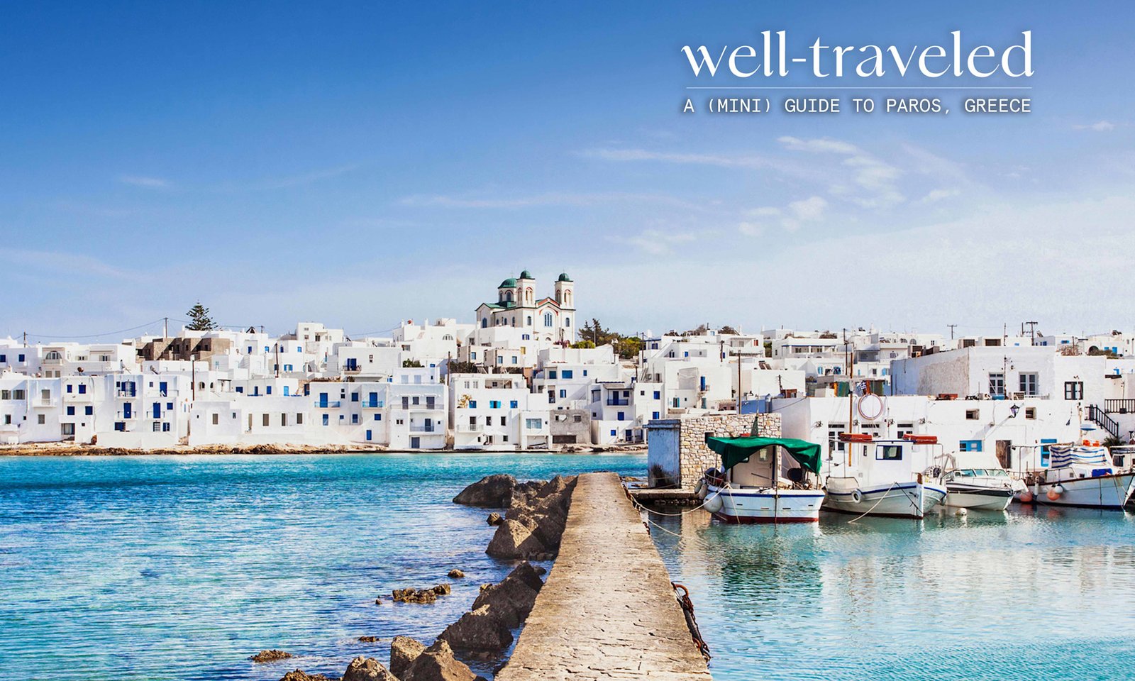 This Greek Island Has Crystal-Clear Water, Incredible Food & Half The Crowds