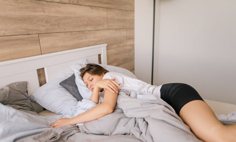 This Very Common Sleep Habit Was Linked To Weight Gain & Slower Metabolism